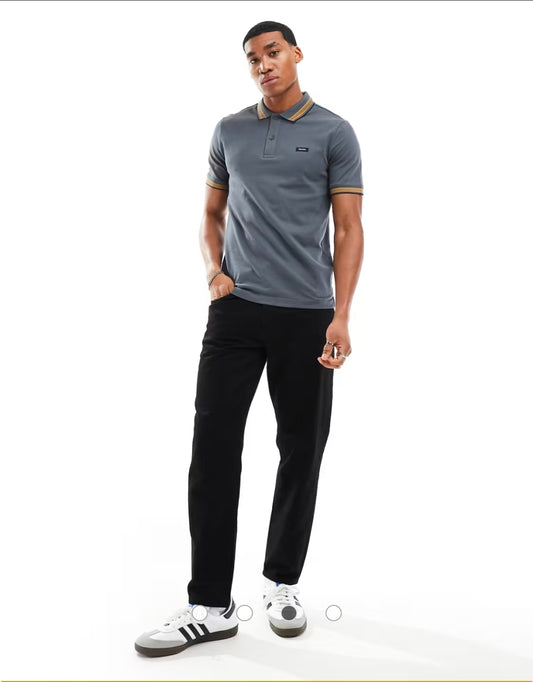 Calvin Klein stretch pique tipped polo.