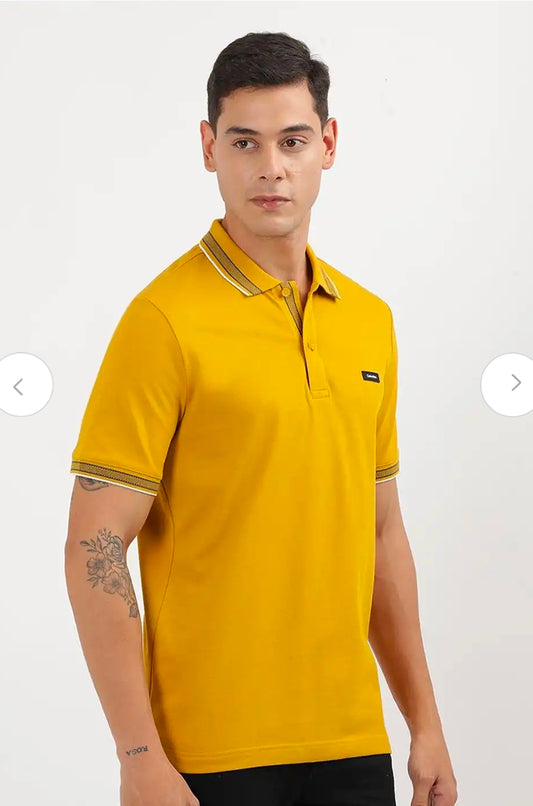 Calvin Klein stretch pique tipped polo.