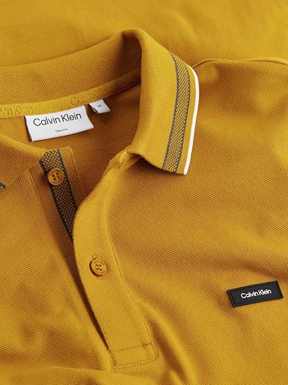 Calvin Klein stretch pique tipped polo.