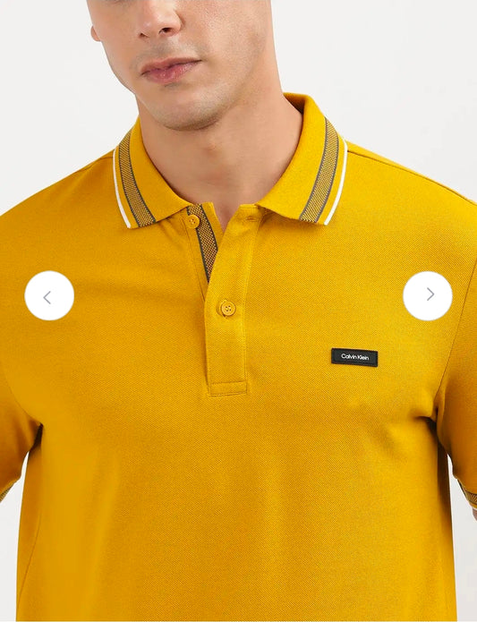 Calvin Klein stretch pique tipped polo.