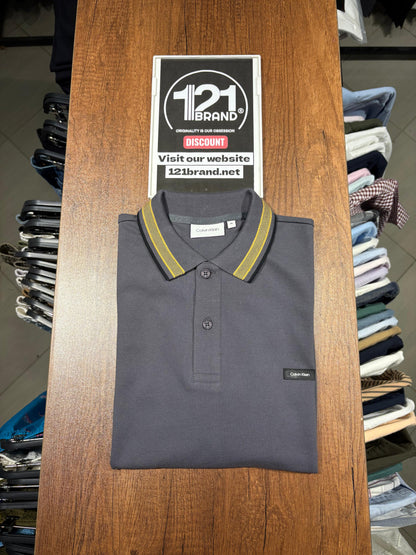 Calvin Klein stretch pique tipped polo.