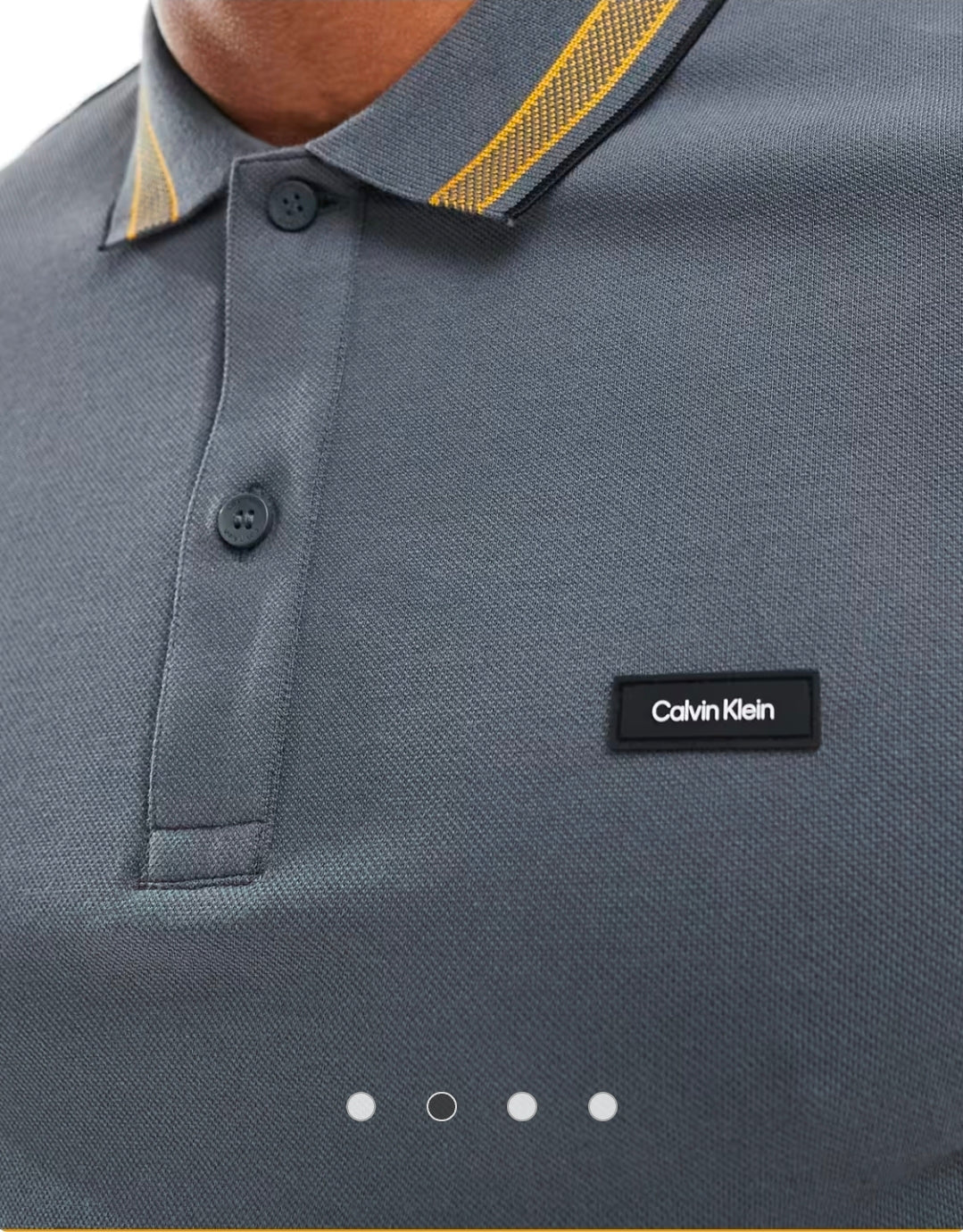 Calvin Klein stretch pique tipped polo.