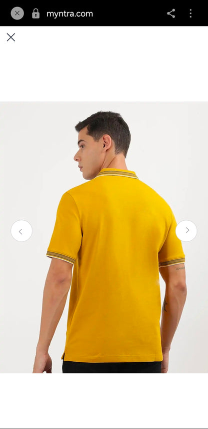 Calvin Klein stretch pique tipped polo.