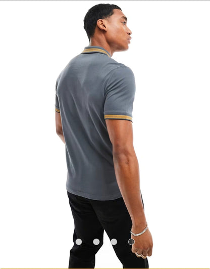 Calvin Klein stretch pique tipped polo.