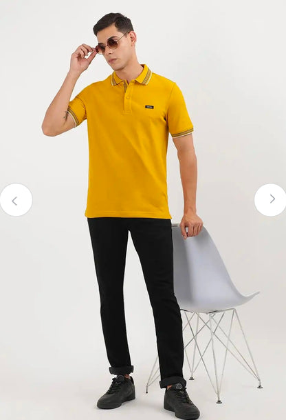 Calvin Klein stretch pique tipped polo.