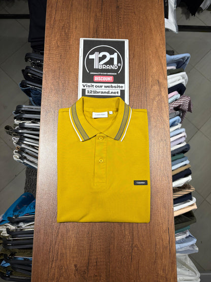 Calvin Klein stretch pique tipped polo.