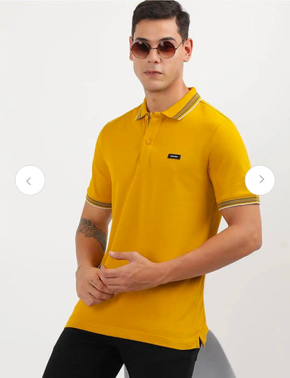 Calvin Klein stretch pique tipped polo.